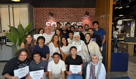 Participants of Foodics Folks showing off their certificates.