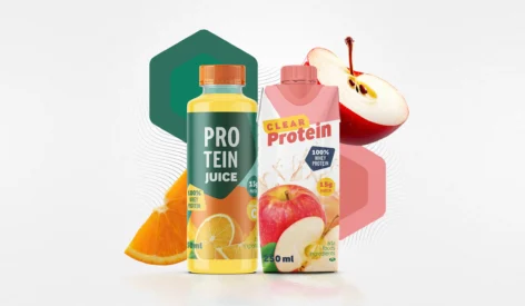 An image of protein juice drink solutions over different fruits.