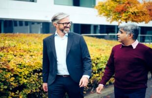 Johan Agrell and Rohan Shirwaiker walking alongside each other as they discuss the transatlantic biosolutions initiative.