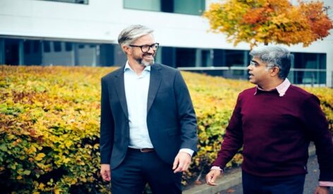 Johan Agrell and Rohan Shirwaiker walking alongside each other as they discuss the transatlantic biosolutions initiative.